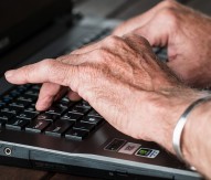 Old person and computer